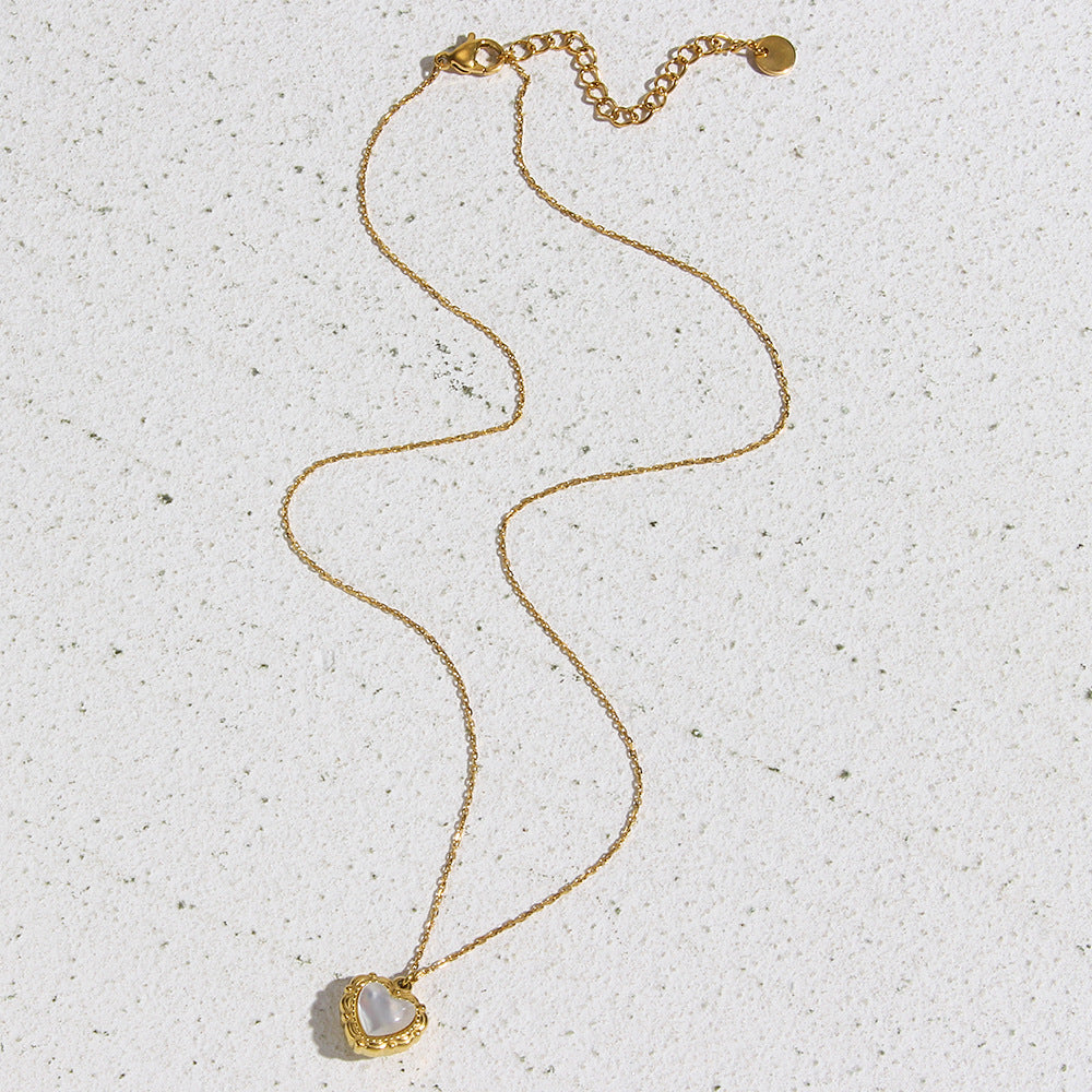 Full necklace laid flat showing chain, extender and clasp