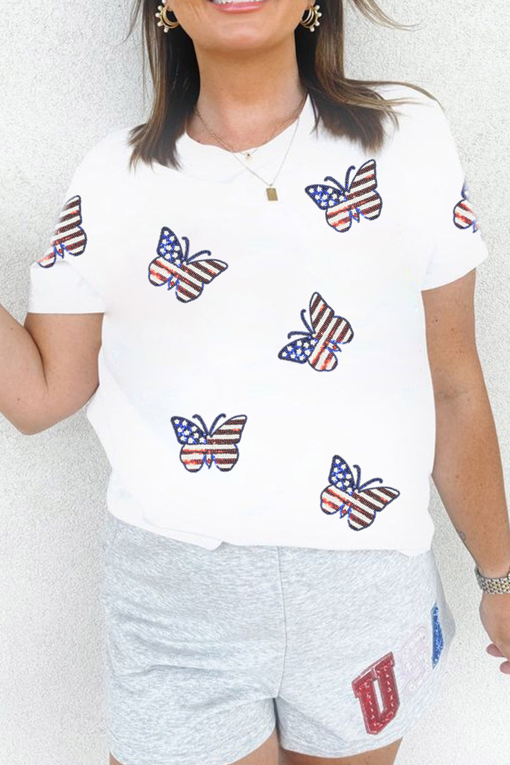 Weißes patriotisches Pailletten-Schmetterling-Freizeit-T-Shirt